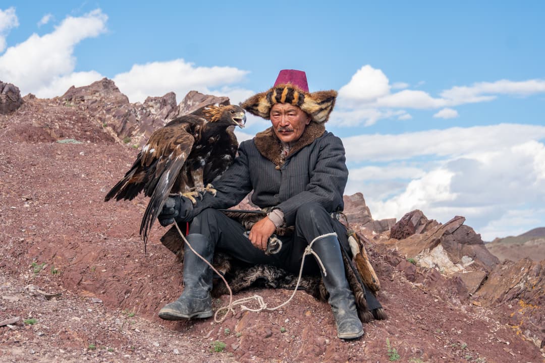 Kazakh eagle hunter with his eagle