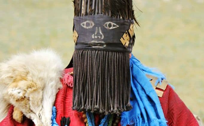 shaman face covered